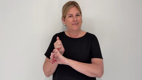The Auslan fingerspelling handshape for the letter S