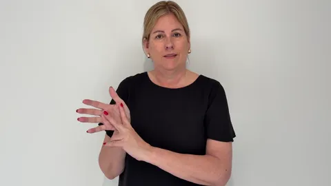 The Auslan fingerspelling handshape for the letter V
